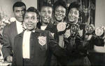 Tigerbelle Track Team and Coach Edward S. Temple With Medals From a 1958 Meet in Moscow by Tennessee State University